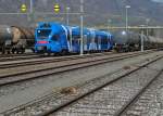 - Versteckt - Zwischen Kesselwagen im Tanklager von Sennwald ein Stadler-FLIRT, Typ ETR 360 der italienischen Bahngesellschaft Sistemi Territoriali S.p.A.
Foto wurde außerhalb des Betriebsgeländes durch einen Zaun aufgenommen (07.03.2014).