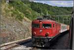 Noch auf dem serbischen Streckenteil der Bar-Linie in der Gegend von Kosjeric kommt uns 441-031 mit einem Reisezug entgegen.