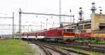 750 300-6 mit Regionalzug Os 6210 Lučenec (11:53) – Detva – Zvolen/Altsohl (13:02) zwischen Gter- und Personenbahnhof in der Zielstadt; 09.06.2012  