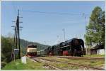 475.196 aus Vr�tky (SK) und 475.179 aus Děč�n (CZ) am 11.5.2013 mit ihrem Sonderzug von Cerven� Skala �ber Margecany nach Vr�tky aufgenommen beim Halt in Telg�rt.