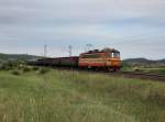 Die 240 088 mit einem Gterzug am 09.06.2012 unterwegs bei Biatorbgy.