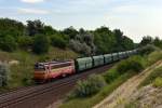 240 001 mit einem Gterzug am 09.06.2012 unterwegs bei Szr.