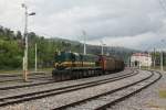 644 014 mit Schiebewandwagen am 02.05.2014 in Postojna.