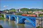 SŽ 814-123 fährt über Draubrücke in Maribor Richtung Pragersko (Nach 3 Jahren Renovierungsarbeitein ist die Brücke endlich fertig).