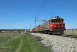 363 029 passes Črnotiče whilst hauling a container train from the Port of Koper, 12 April 2016