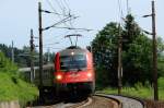 SZ 541 109 fhrt am 06.06.12 mit IC 313 Villach Hbf - Ljubljana und etwas Sonne um die Kurve hinter Rosenbach.