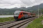 Ein besprayter Desiro ist am Ufer der Save unterwegs. Am 28.4.2008 fuhr 312102 hier bei Orchovo die Leistung nach Dobova in Slowenien.