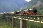 Anlsslich einer Fahrt auf der Wocheinerbahn (Strategische Bahn zwischen Jesenice u.Grz),Sonderzug mit Lok 06-018 (Borsig 1930)und der ehem.Sdbahnlok 03-002 (WLF 1914)im Mai 1989 
(Archiv P.Walter)
