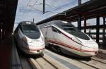 Hier links 114 614-1 als A8119 von Madrid Chamartin nach Valladolid Campo Grande und rechts 114 611-7 als A8158 von Valladolid Campo Grande nach Madrid Chamartin, diese beiden Triebzge standen am