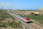 A class 592 dmu passes Port Saplaya whilst working the 1615 Caudiel - Valencia North,  7 July 2020