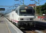 252 075-7 mit ihrem Talgo auf dem Weg nach Barcelona in Castelldefels am 15.9.2014.