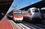 Hier links 465 022-2 als R17105 von Madrid Chamartin nach Alcobe S.S./Reys und rechts  334-027-0 mit TLG278 von Madrid Camartin nach Almeria, diese beiden Zge standen am 11.3.2012 in Madrid Chamartin.