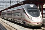 Hier 114 611-7 als A8158 von Valladolid Campo Grande nach Madrid Chamartin, bei der Einfahrt am 10.3.2012 in Madrid Chamartin.