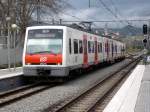 Schmalspurzug 213.73 fhrt am 09.03.2008 in Richtung Placa Espanya in der Station Sant Boi an der Stadtgrenze von Barcelona ein, auf dieser Strecke fahren die Linien L8, R5, R6, S4 und S33