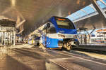 ET 320 wartet in Salzburg Hbf auf die Abfahrt als M 79034 nach München Hbf.