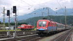 Taurus 1116 013 Rail Cargo Hungaria mit dem ÖEC 111 München - Klagenfurt bei Einfahrt in Spittal-Millstättersee; 28.07.2011  