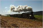 Kilometerweit sah man in der Ferne schon die gewaltige Dampfwolke, bevor die 671 der GKB mit dem Sonderzug von Graz nach Weiz an uns vorbeifuhr.