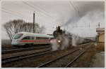 Treffen der Generationen. 310.23 mit ihrem SDZ R 16806 wird am 13.12.2008 von IC 28 (Wien Westbahnhof -Frankfurt(Main)Hbf) in Kirchstetten berholt.