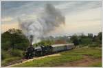 310.23 mit einem Schnellzug bei der Parade in Strasshof am 22.9.2012.