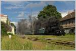 Die als 375 007 beschriftete 310.23 aus Strasshof bespannte zusammen mit 354 7152 vom Prager Eisenbahnklubs KHKD anlässlich des k&k Dampfloktreffens im Eisenbahnmuseum Lu¸ná u Rakovníka am 23.6.2013 einen Fotosonderzug von Praha Masarykovo nádra¸í (Prag Masaryk-Bahnhof) nach Lu¸ná u Rakovníka. Die Aufnahme zeigt den Zug bei der Durchfahrt in Praha-Dejvice. 

Die richtige 375 007 steht übrigens im Prager Verkehrsmuseum.