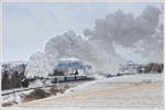 92.2271 vom MLV als Vorspann vor 93.1420 am 10.2.2013 als NF 95405 von Zwettl nach Waldhausen mit Blick auf Zwettl.