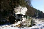 ZB 2 der Zillertalbahn und die bosnische 83-180 dampfen auf der Feistritztalbahn, mit einem Adventzug, von Weiz nach Birkfeld.