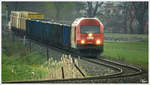 2016 054 fährt mit einem Hackschnitzelleerzug von Pöls nach Zeltweg, aufgenommen mit einer 1000mm Russentonne (UDSSR Bj 1977 :O)   Fohnsdorf 07_04_2016