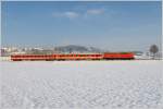 2043 005 mit Schlieren bei der Abschiedfahrt auf der Donauuferbahn von Linz nach Spitz.
Arbing  27.11.2010