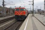 BB 2050.09 und NLB 93.1420 fahren am 30.November 2013 mit dem SLP 19158 in Wien Meidling ein.