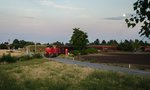 2070 048 vom GM-Werk Aspern kommend unterwegs Richtung Stadlau am 30.Juni.2015    Der Zug quert soeben den Bahnübergang mit der Ostbahnbegleitstraße