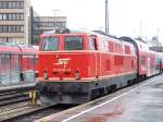 BR 2143.021-0 der SVG mit einem City Shuttle Doppelstockwagen am Holzkirchner Bahnhof in Mnchen.