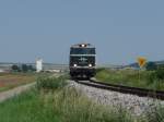 Der heutige Sonderzug auf der Landesbahn zwischen Korneuburg war die grne 2143 040-0. (zwischen Stetten und Harmannsdorf, 01.08.09)