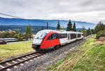 5022 024-1  ARNOLDSTEIN Dreiländereck  fährt als S4 4822 (Hermagor - Villach Hbf) nahe der Haltestelle Presseggersee vorüber.
Aufgenommen am 1.10.2017.