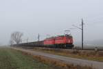   1040 013 und 1010 003 mit der Leerrübe LGAG 59106 von Tulln an der Donau (Tu) nach Göllersdorf (Gr), kurz vor erreichen des Einfahrvorsignals von Hausleiten (Hui); am 04.01.2014 