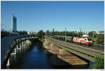 1014.011 am REX Leiser Berge; Wien-Schnellbahnbrcke, 28.08.2011  (2 Lampen virtuell entfernt.)