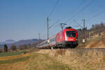 1016 050 mit IC 119 Dortmund-Innsbruck am 11.03.2022 bei Kuchen. 