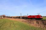 1016 007-5 ist mit einem Kesselwagenzug auf dem Weg nach Salzburg. Aufgenommen am 29. Dezember 2012 bei Weisham.