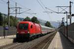 1016 011-7 mit IC 1284 Schwarzach-St.Veit-Flensburg (D) auf Bahnhof Brixen im Thale am 28-7-2013.