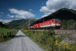 1144 246 und 1016 044 befrdern 03.09.2013 einen gemischten Gterzug auf der Tauernbahn zwischen Dorfgastein und Bad Hofgastein sdwrts.