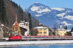 Die 1016 034-1 der ÖBB mit einem Personenzug am 12.02.15 bei Kiefersfelden kurz vor Kufstein in Richtung Brenner.