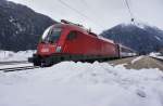 1016 040-0 mit EC 113 (Frankfurt (M) Hbf - Klagenfurt Hbf/- Zagreb Glavni kol.), am 13.3.2016 bei der Abfahrt in Mallnitz-Obervellach.