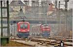 1016 047 von IC 118 und IRE4211 mit 218 496-8 in Lindau Hbf.