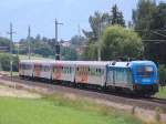 Ein Bild aus wrmeren Tagen: 1016 023 schiebt am  20.06.2008 den R3951 am Einfahrtssignal in Wartberg/Kr.