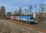 1016 023 mit einem REX nach Linz am 08.02.2014 bei Kimpling.