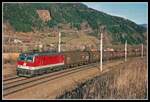 1044 060 mit Güterzug bei Oberaich am 7.03.2002.