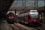 4024 079 erreicht auf dem Weg von Rosenheim nach Telfs-Pfaffenhofen den Bahnhof Kufstein und trifft die 1063 047.