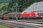 Blick auf 1116 087, als diese am Morgen des 05.07.2018 zusammen mit 1016 012 und einem Güterzug im Grenzbahnhof von Brennero stand. Links steht die FS D 245 6020, welche sich gleich in Bewegung stezt, um die zwei Tauris wieder zurück nach Österreich zu bringen.