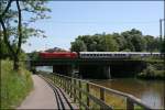 Eine 1116 berquert am 25.06.07 mit dem InterCity 2082  Knigssee  von Berchtesgaden nach Hamburg-Altona die Mangfall in Rosenheim.