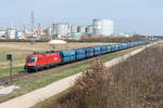 1116 041 mit einem PKP Cargo Kohlenzug vor der Tullner Zuckerfabrik, am 27.03.2021.