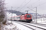 1116 064 mit EC113 Frankfurt-Klagenfurt am 11.12.2021 bei Urspring.